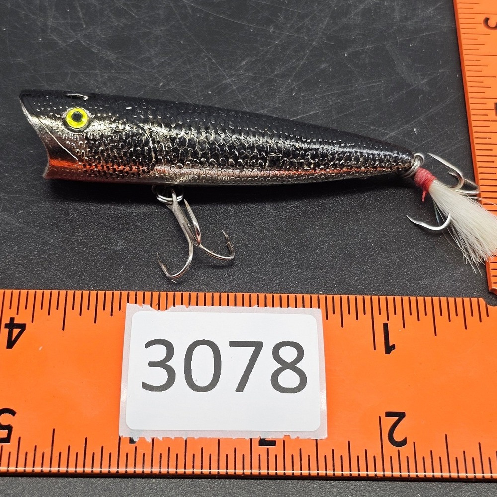 VTG Chug'n Spit Topwater Popper Fishing Lure Silver Black Orange Feathered Hook